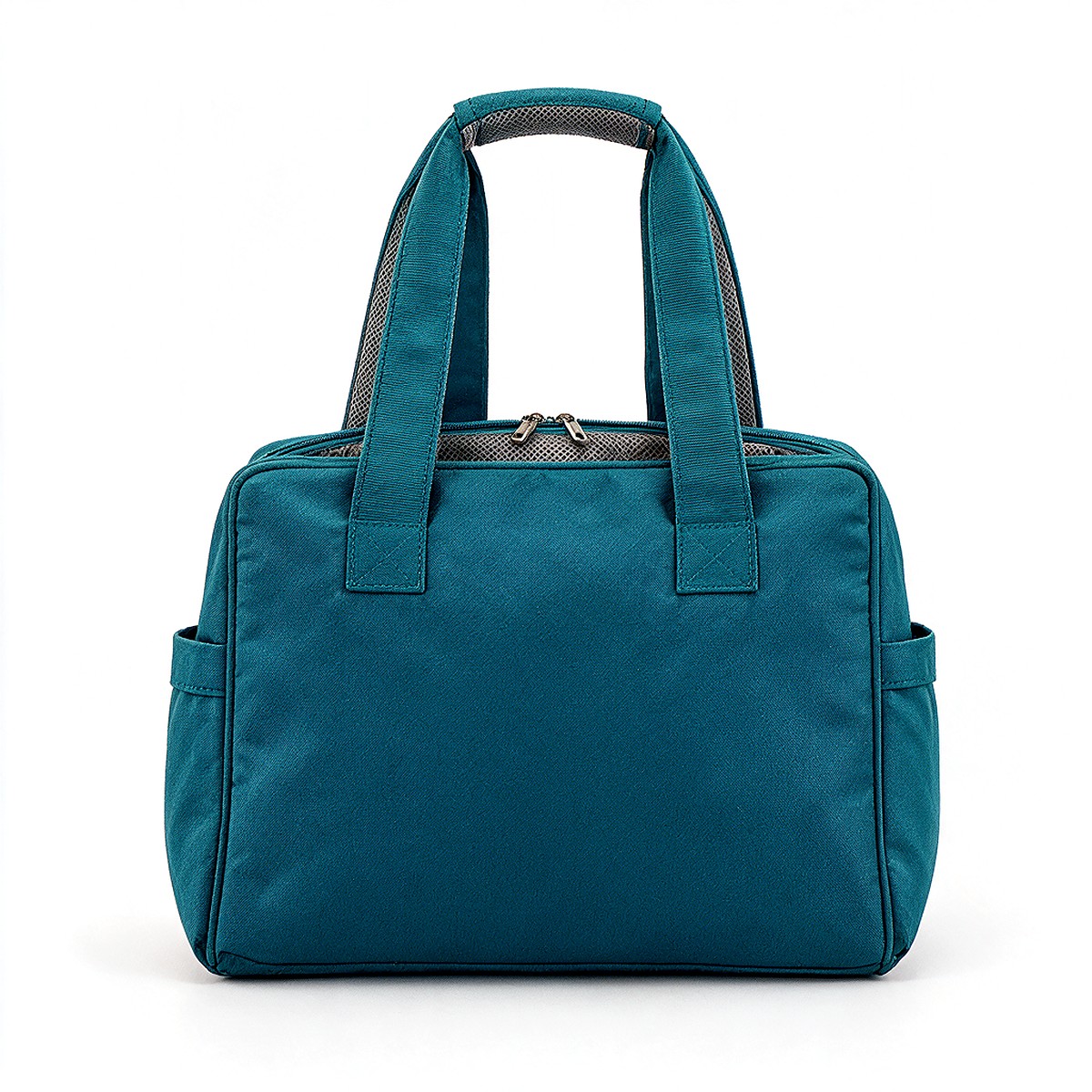 Tote standing upright with padded handles